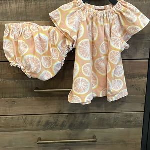 Milkbarn short sleeve and bloomer set. Light pink grapefruit print size 6-12 m